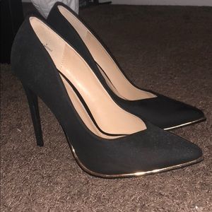 Black heels with gold lining